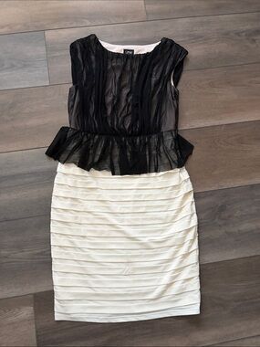 Jax Black and White Pleated Peplum Mini Dress